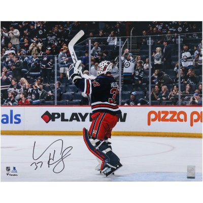 Connor Hellebuyck Winnipeg Jets Autographed Fanatics Authentic 16 x 20 Navy Alternate Jersey Celebration Photograph