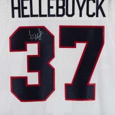 Игровая джерси Connor Hellebuyck Winnipeg Jets Autographed Fanatics Authentic White Heritage Classic adidas Authentic