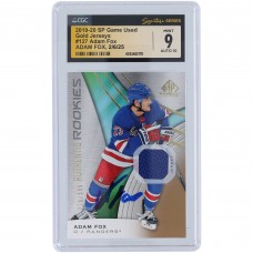 Adam Fox New York Rangers Autographed 2019-20 Upper Deck SP Game Used Gold Jersey Blue Relic #127 #/599 CGC Fanatics Witnessed Authenticated 9/10 Rookie Card Adam Fox New York Rangers Autographed 2019-20 Upper Deck SP Game Used Gold Jersey Blue Relic #127 #/599 CGC Fanatics Witnessed Authenticated 9/10 Rookie Card