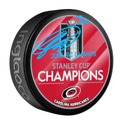 Шайба Sebastian Aho Carolina Hurricanes Autographed Fanatics Authentic 2026 Stanley Cup Champions with 2026 SC Champs' Inscription