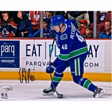 Autographed Vancouver Canucks Elias Pettersson Fanatics Authentic 8 x 10 Blue Jersey Shooting Photograph