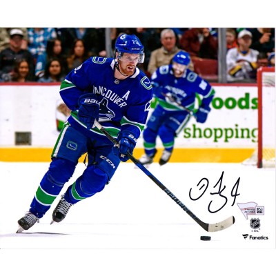 Autographed Vancouver Canucks Daniel Sedin Fanatics Authentic 8 x 10 Blue Jersey Skating Photograph