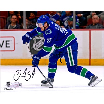 Autographed Vancouver Canucks Daniel Sedin Fanatics Authentic 8 x 10 Blue Jersey Shooting Photograph
