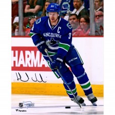 Autographed Vancouver Canucks Henrik Sedin Fanatics Authentic 8 x 10 Blue Jersey Skating Photograph