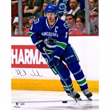 Autographed Vancouver Canucks Henrik Sedin Fanatics Authentic 16 x 20 Blue Jersey Skating Photograph