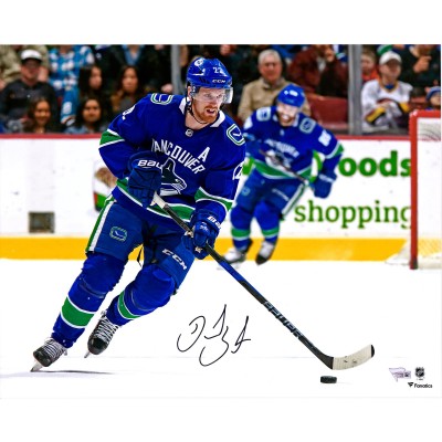 Autographed Vancouver Canucks Daniel Sedin Fanatics Authentic 16 x 20 Blue Jersey Skating Photograph