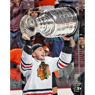 Unsigned Chicago Blackhawks Patrick Kane Fanatics Authentic 2010 Stanley Cup Champions Raising Cup Photograph