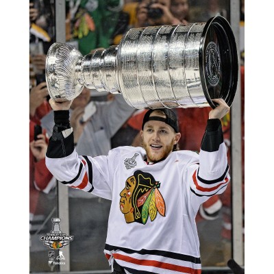 Unsigned Chicago Blackhawks Patrick Kane Fanatics Authentic 2013 Stanley Cup Champions Raising Cup Photograph
