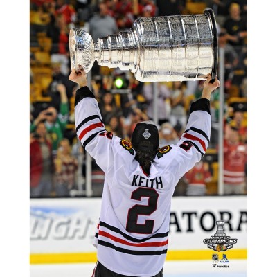 Unsigned Chicago Blackhawks Duncan Keith Fanatics Authentic 2013 Stanley Cup Champions Raising Cup Photograph