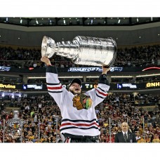 Unsigned Chicago Blackhawks Jonathan Toews Fanatics Authentic 2013 Stanley Cup Champions Raising Cup Photograph