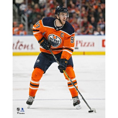 Unsigned Edmonton Oilers Connor McDavid Fanatics Authentic Orange Jersey Skating Photograph