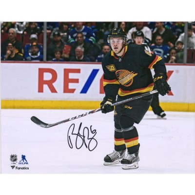 Autographed Vancouver Canucks Brock Boeser Fanatics Authentic 8 x 10 Black Jersey Skating Photograph