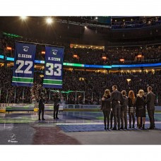 Unsigned Vancouver Canucks Daniel Sedin and Henrik Sedin Fanatics Authentic Jersey Retirement Night Banner Raising Photograph