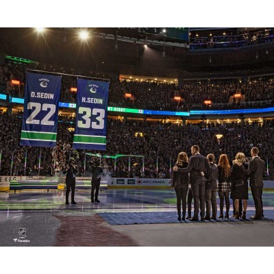 Unsigned Vancouver Canucks Daniel Sedin and Henrik Sedin Fanatics Authentic Jersey Retirement Night Banner Raising Photograph