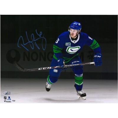 Autographed Vancouver Canucks Brock Boeser Fanatics Authentic 11 x 14 Blue Alternate Jersey Skating Spotlight Photograph - Limited Edition of 20
