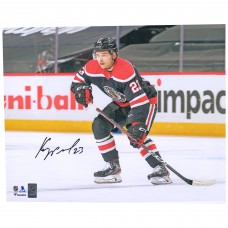 Autographed Chicago Blackhawks Philipp Kurashev Fanatics Authentic 16 x 20 Reverse Retro Skating Photograph