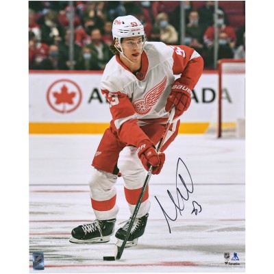 Autographed Detroit Red Wings Moritz Seider Fanatics Authentic 16 x 20 Skating with Puck Photograph