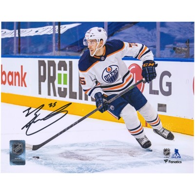 Autographed Edmonton Oilers Evan Bouchard Fanatics Authentic 8 x 10 White Jersey with Puck Photograph
