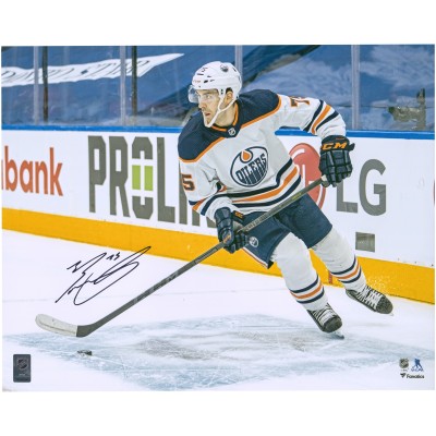 Autographed Edmonton Oilers Evan Bouchard Fanatics Authentic 16 x 20 White Jersey with Puck Photograph