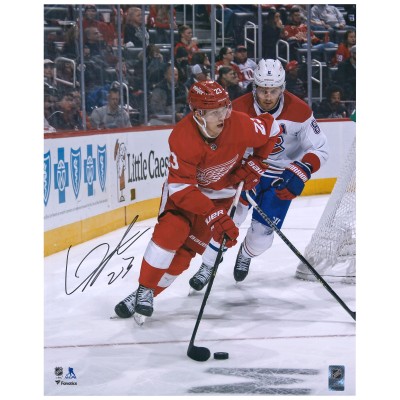 Autographed Detroit Red Wings Lucas Raymond Fanatics Authentic 16 x 20 Red Jersey with Puck Photograph