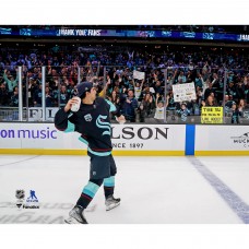 Unsigned Seattle Kraken Matty Beniers Fanatics Authentic Throws T-Shirt to Fans on Fan Appreciation Night Photograph