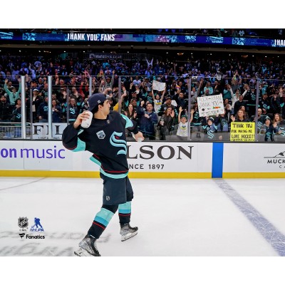 Unsigned Seattle Kraken Matty Beniers Fanatics Authentic Throws T-Shirt to Fans on Fan Appreciation Night Photograph