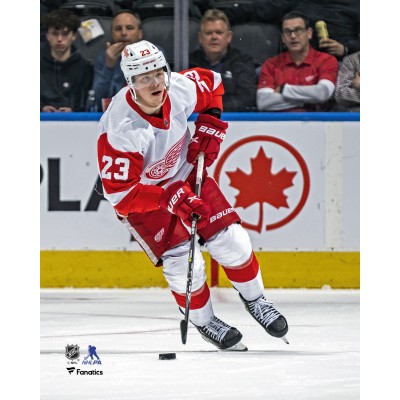 Unsigned Detroit Red Wings Lucas Raymond Fanatics Authentic Skating with Puck Photograph