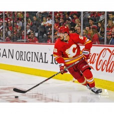 MacKenzie Weegar Calgary Flames Unsigned Fanatics Authentic Carries the Puck Photograph
